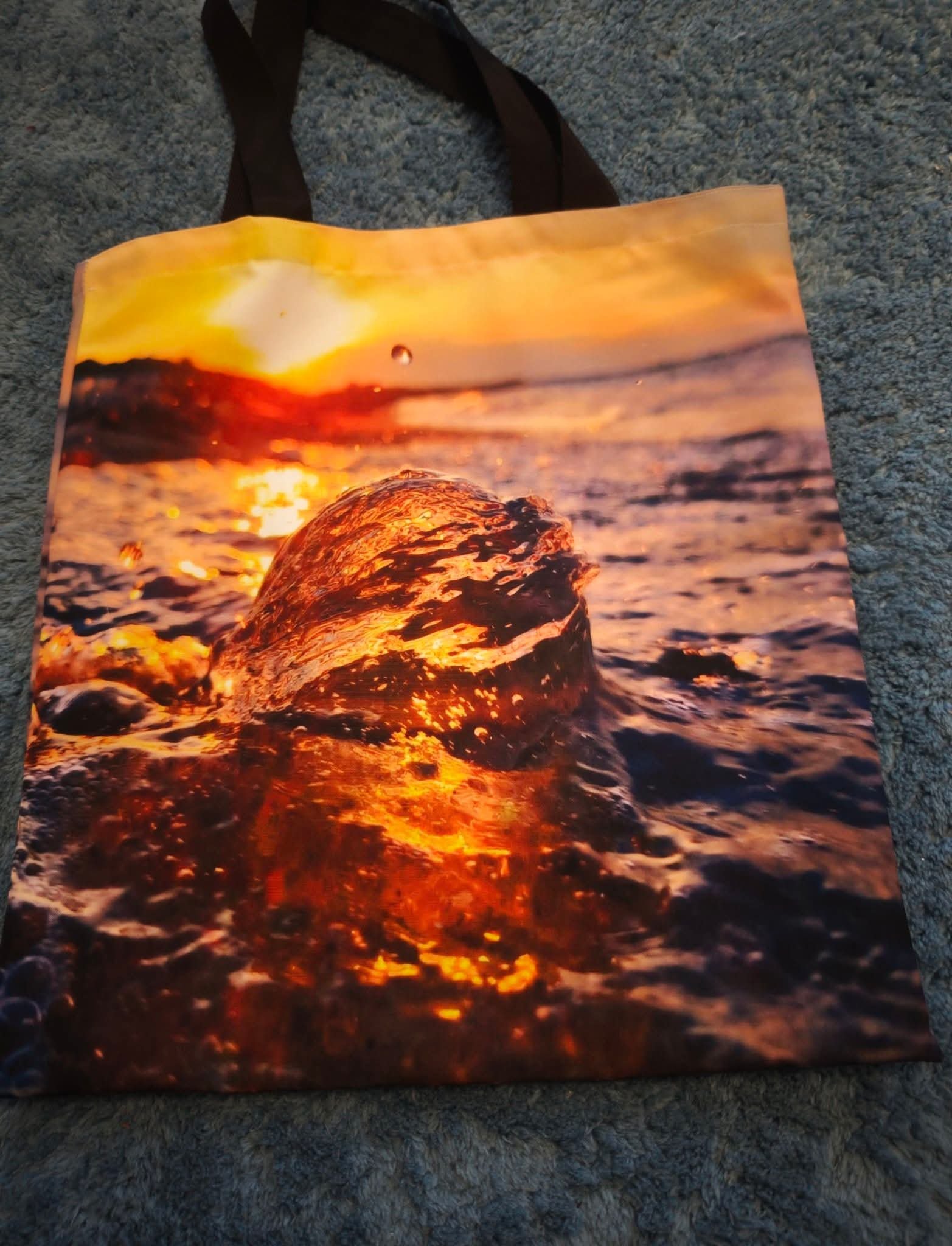 Shopping Beutel mit Fotokugel in der Ostsee
